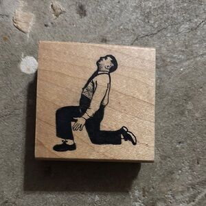 Vintage Wooden Rubber Stamp with Kneeling Man Design